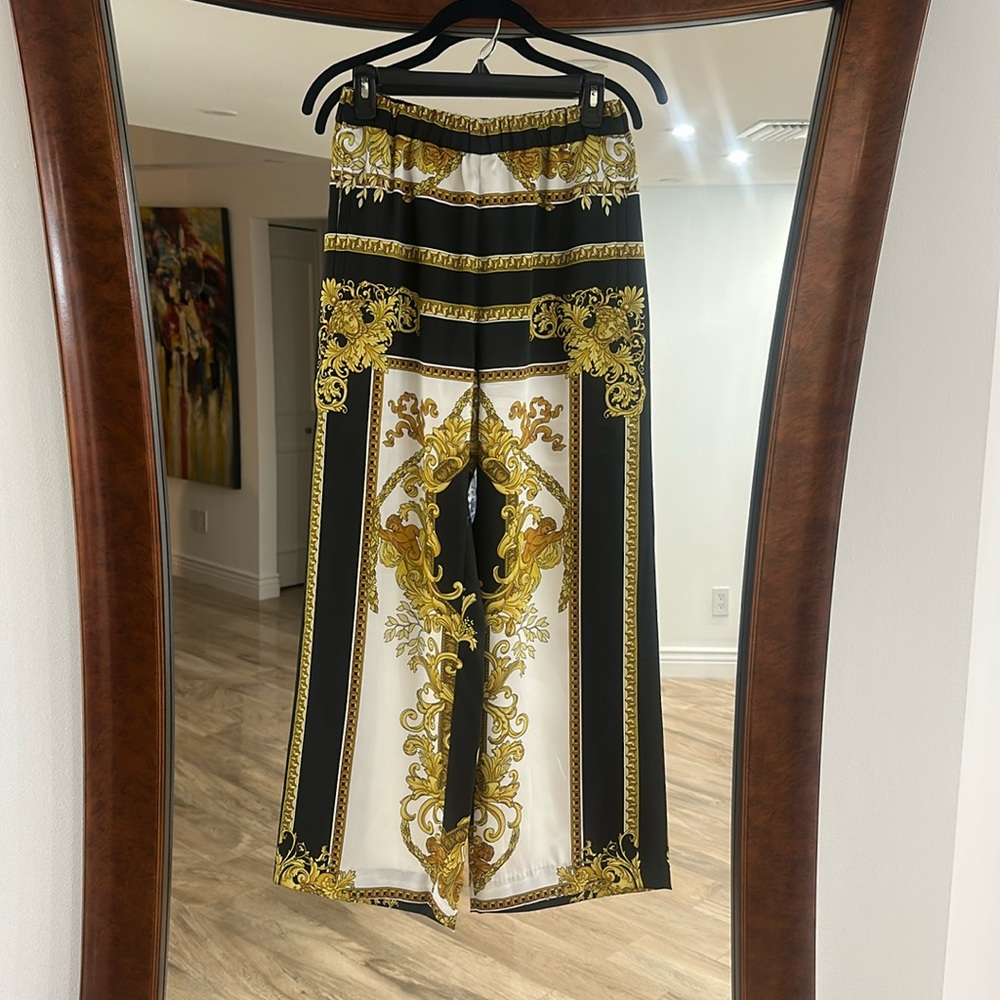 Versace silky pants 40. Can fit Med-xtra large